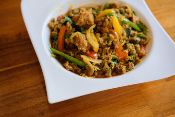 soft shell crab stir fried with curry powder paste, bell pepper, onion