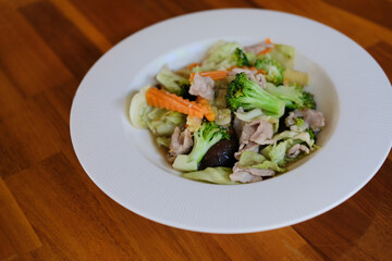 vegetable, broccoli, carrot, baby corn and mushroom stir fried with pork