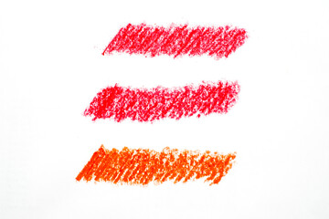 Abstract crayon on white background. Red crayon scribble texture. Wax pastel spot. It is a hand drawn