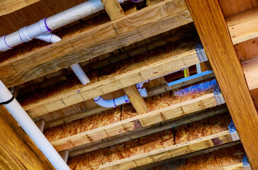 Fototapeta premium Under construction newhome PVC waste water system rough plumbing