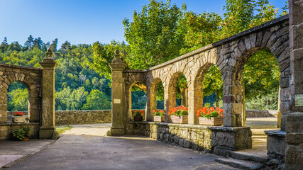Fototapeta na wymiar Notre Dame d'Ay in Ardeche is a medieval sanctuary where you can still see the grounds, the chapel and the tower of the castle.