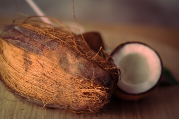 healthy coconut milk with whole nut, whole coconut and coconut milk with coconut powder on wooden table,fresh nariyal hd footage ,selective focus on subject,