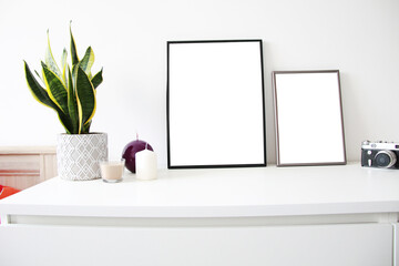two vertical mockup frames on the table