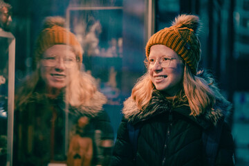 Woman looking in a store window