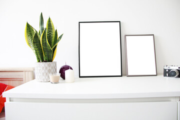 two vertical mockup frames on the table