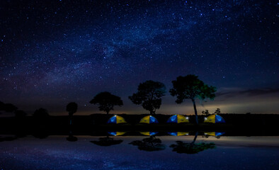 Panorama blue night sky milky way and stars. with blur shadow.
