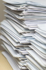 bundles bales of paper documents. stacks packs pile on the desk in the office