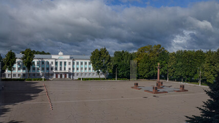 City Administration building and City of Military Glory monument on Lenin Square of Velikiye Luki, Pskov region, Russia  - obrazy, fototapety, plakaty