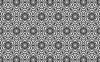 Ethnic black and white pattern. Geometric background of flowers in traditional folk style for coloring, wallpaper, textiles.