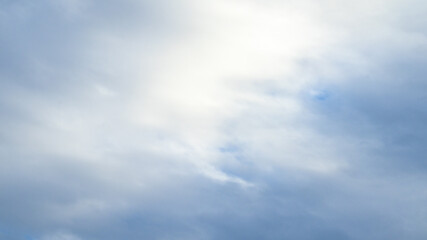 Sky cloudscape photograph, the light coming through white clouds,