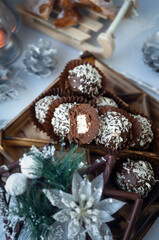 Luxury handmade chocolate Bonbon assortment of delicious decorative round candies on the Christmas table for the celebration