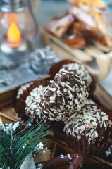 Luxury handmade chocolate Bonbon assortment of delicious decorative round candies on the Christmas table for the celebration.
