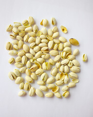 Pistachios isolated on white background, top view. 
