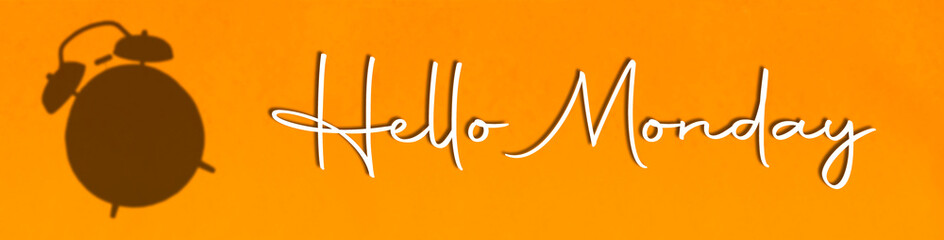 lettering hello monday with silhouette alarm on orange background