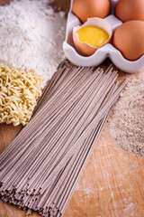 instant egg noodles on a wooden rustic background
