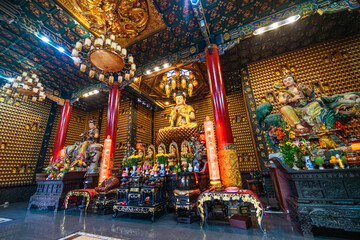 Fototapeta premium Interior of Thousand Buddha Temple or Chua Van Phat pagoda in District 5, Ho Chi Minh City, Vietnam