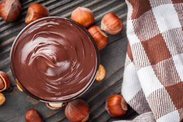 toasts with chocolate butter on a dark wooden rustic background