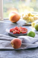 Fresh fruits and berries on the table, home cooking, organic food, healthy lifestyle