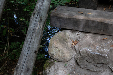 Details from wood and stone bridge