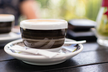 Cup Of Coffee On Table In Cafe