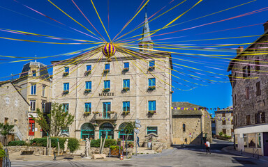 Fototapeta na wymiar The main square of Tence (place de l'Hôtel de ville), a small town in Auvergne, France