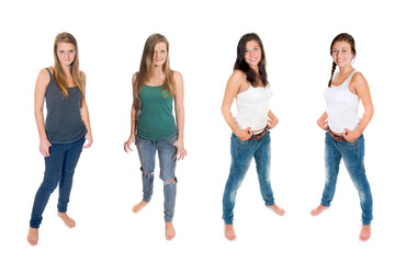Four full length portraits of two beautiful teenage girls, eighteen and nineteen years old, wearing blue jeans and tops, isolated on white studio background