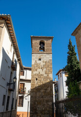 Fototapeta na wymiar Bell tower of the Church of Salvador (13th century) in the Albaicín de Granada (Spain)
