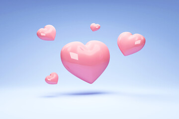 Fototapeta na wymiar Heap of Love Hearts on blue studio background