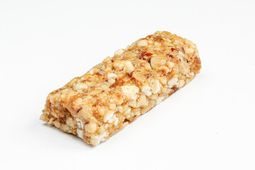 Single granola bar isolated on white background. Healthy food