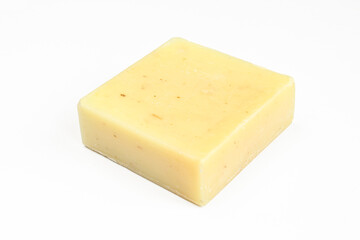 Single herbal square shaped soap isolated on white background