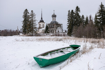 old temple on the shore in winter