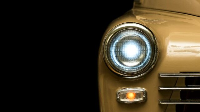 retro car with headlights close-up, panorama