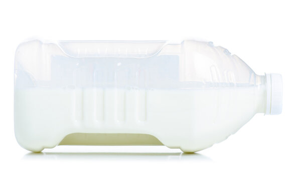 Plastic bottle of milk on white background isolation