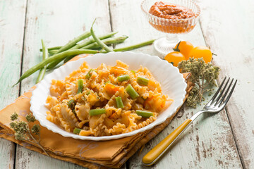 pasta with dried tomatoes pesto and green peas