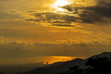 View of the city of Izmir, Turkey. Panorama of Izmir after sunset at golden hour from the sea.