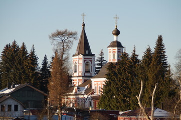 Russia, cross on the Church in the village in winter