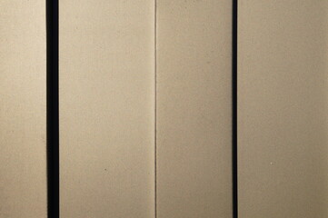 Fototapeta premium fragment of a grey iron corrugated fence