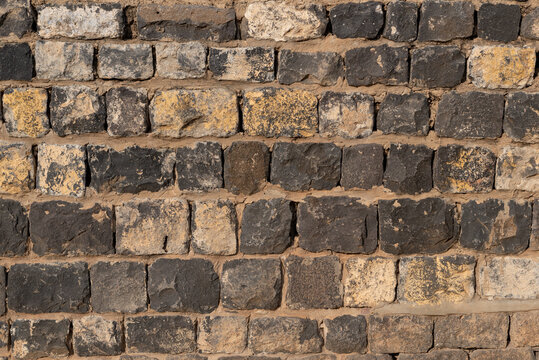 Stone wall at Kursi National Park in Israel. Background.