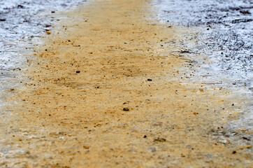 Sandy winter road close up