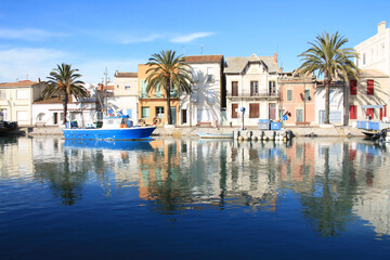 Lighthouse and old fishing port of Grau du roi in Camargue, a resort on the coast of Occitanie region in France
