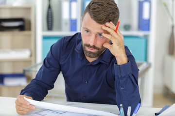 architect thinking about house construction