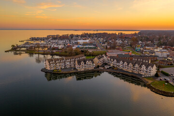 Aerial view of downtown Havre de Grace in Maryland with luxury waterfront apartment complex...
