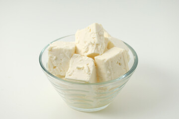 A glass bowl with sheep cheese
