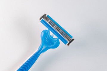 Blue and white modern razor - detail in macro