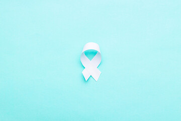 oncology and disease symbol cut out over blue background. above view. outer space
