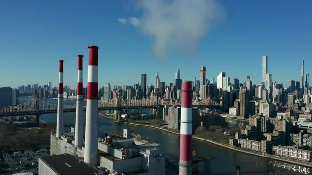 alt flying clockwise around smokestacks of LIC power plant
