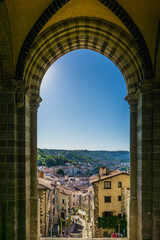 View from the main door of the Cathedral of Our Lady of the Annunciation or Cathedrale Notre-Dame du Puy on the medieval streets of the old town of le Puy en Velay, Auvergne, France