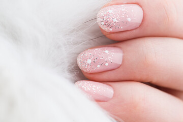Nails Design. Christmas Manicure isolated on white Background. Close Up Of Female Hands. Art Nail.