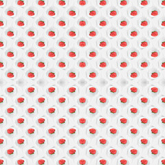 Ripe strawberries fall into the cream with a splash. Seamless background