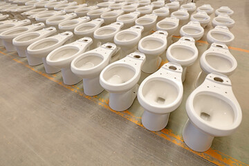 Semi-finished ceramic toilets are in the factory